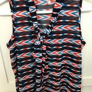 Sleeveless Sheer patterned blouse with tie neck